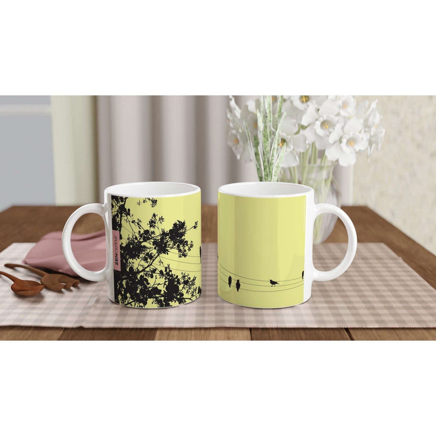 taza decorada en amarillo con pajaritos