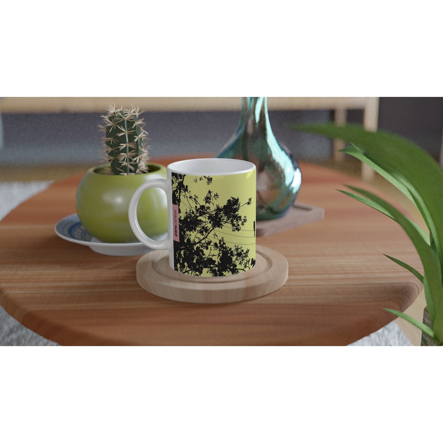 taza decorada en amarillo con pajaritos