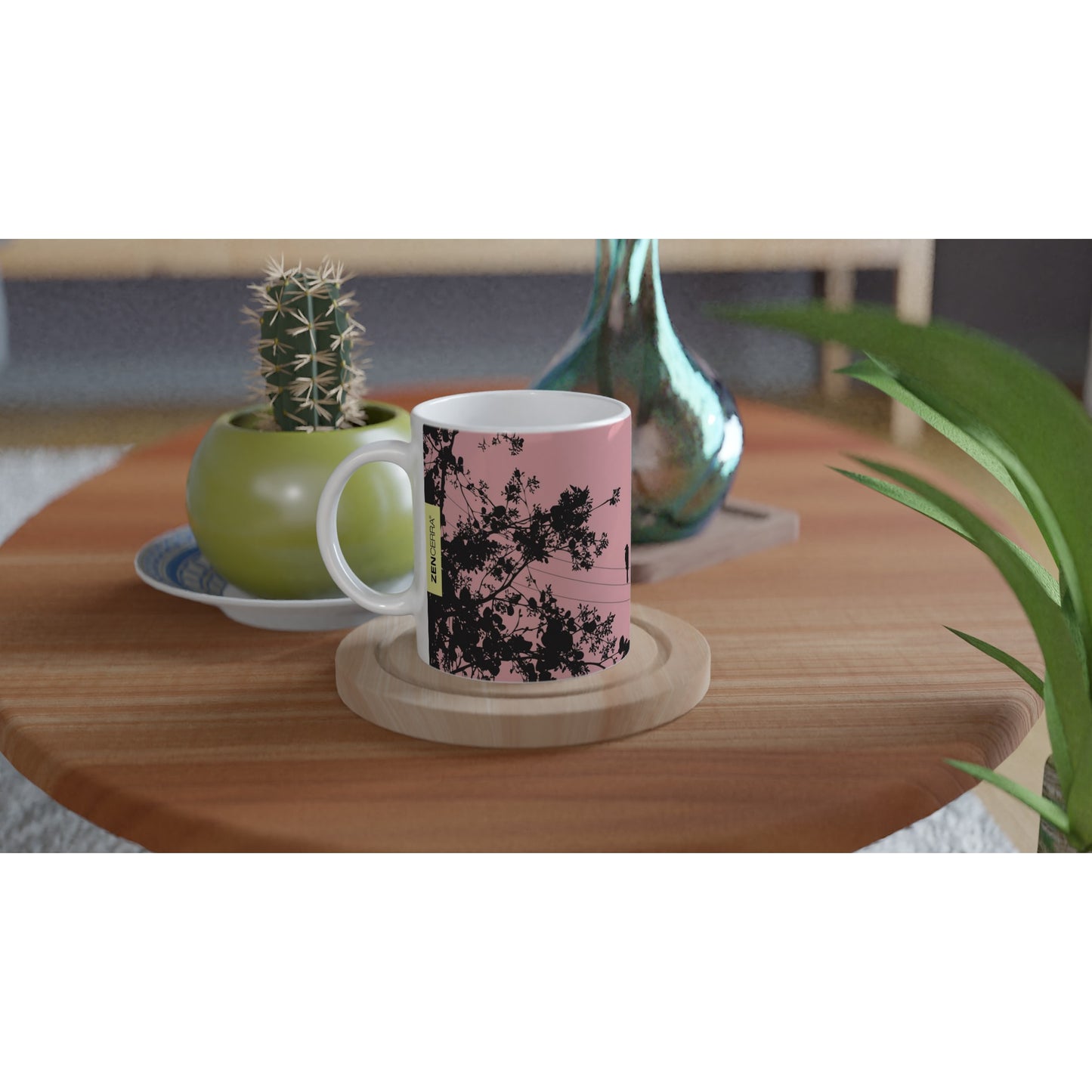 taza decorada en rosa claro con pajaritos
