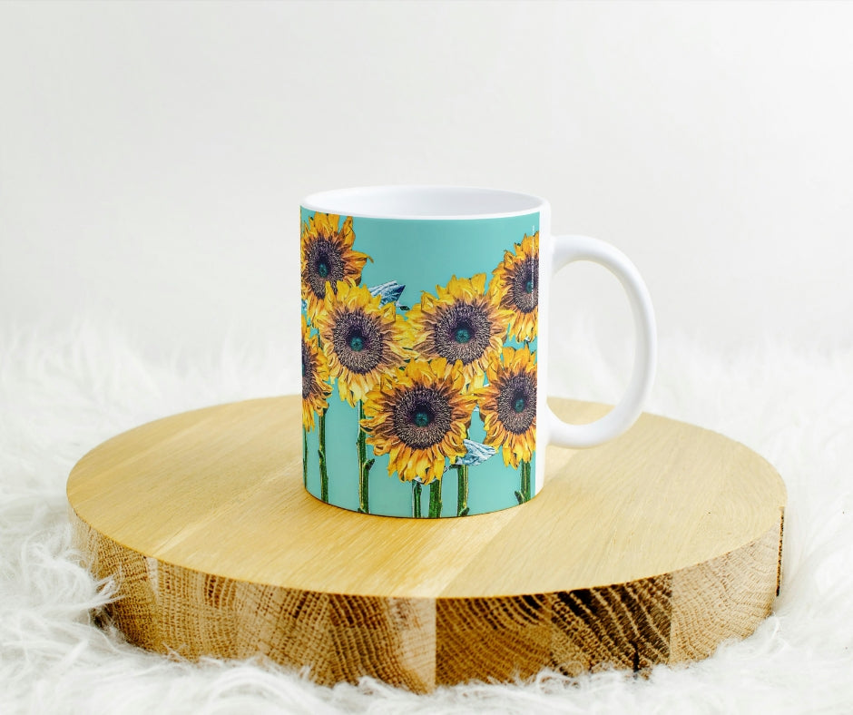taza decorada por girasoles