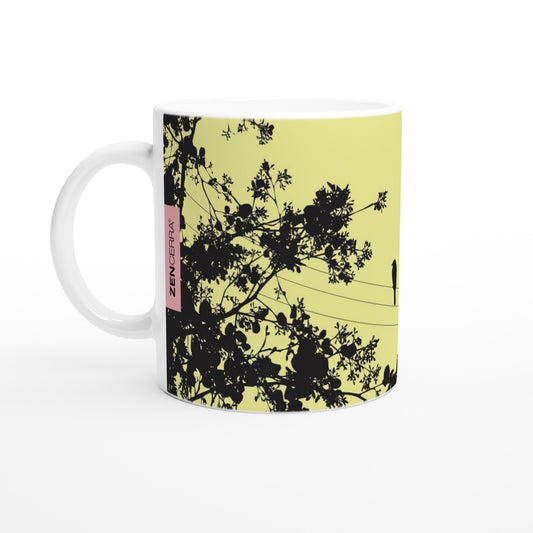 taza decorada en amarillo con pajaritos